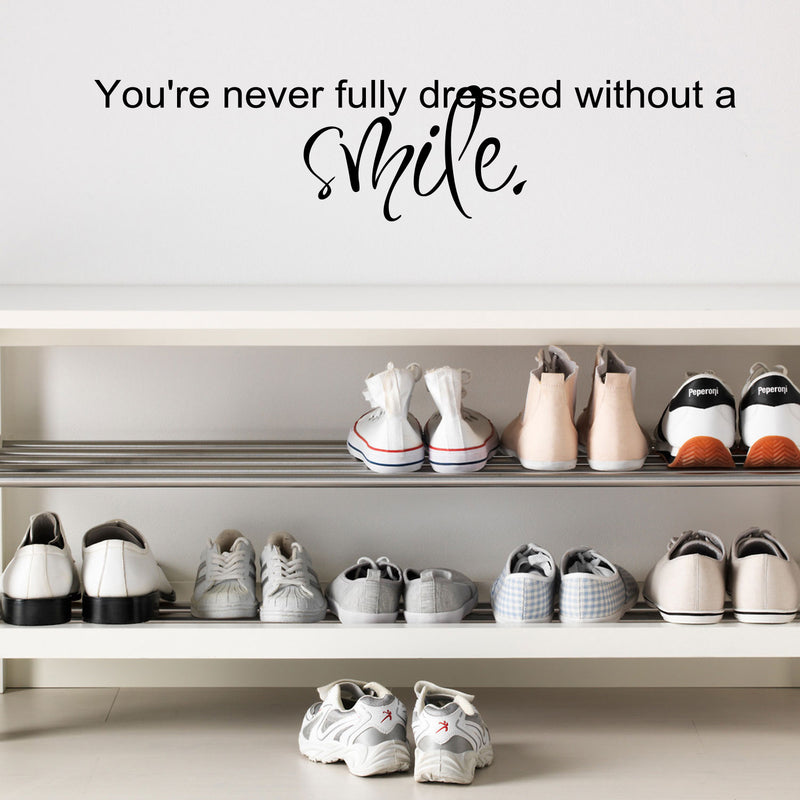 Imprinted Designs You’re Never Fully Dressed Without a Smile. Vinyl Wall Decal Sticker Art (Large 8" X 36") Black 8" x 36" 3