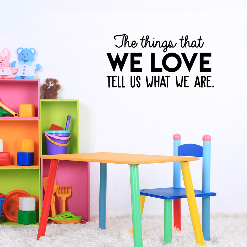Vinyl Wall Art Decal - The Things That We Love Tell Us What We Are - 15" x 30" - Modern Inspirational Quote For Home Bedroom Kids Room Playroom Office School Decoration Sticker Black 15" x 30" 2